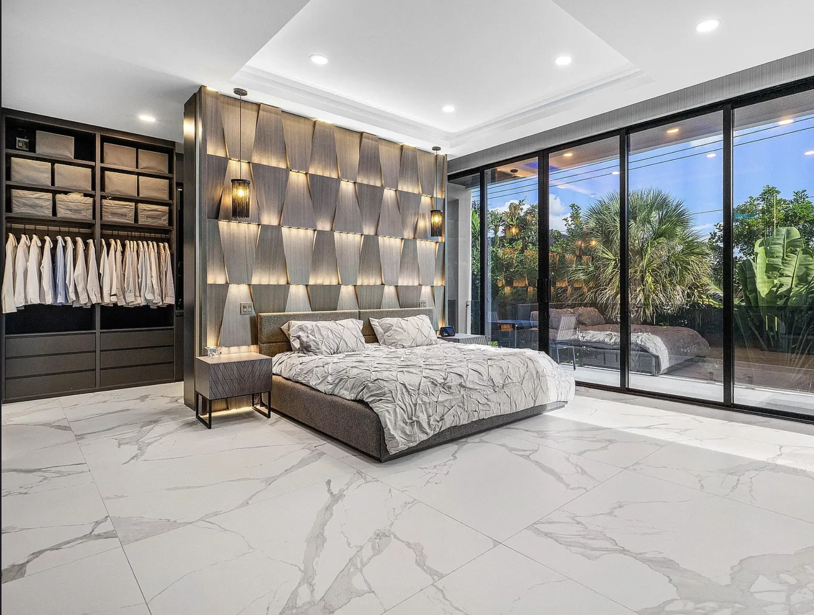 Primary bedroom with glass wall